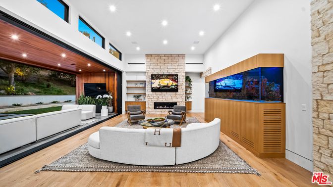 Fireplace, Interior, Living room, Recessed Lighting, Stone Walls, Wood Texture Flooring, Wooden Walls