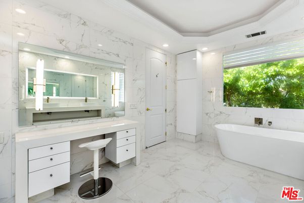 Bathroom, Dual Sink Vanities, Free Standing Baths, Interior, Marble, Marble Walls, Recessed Lighting