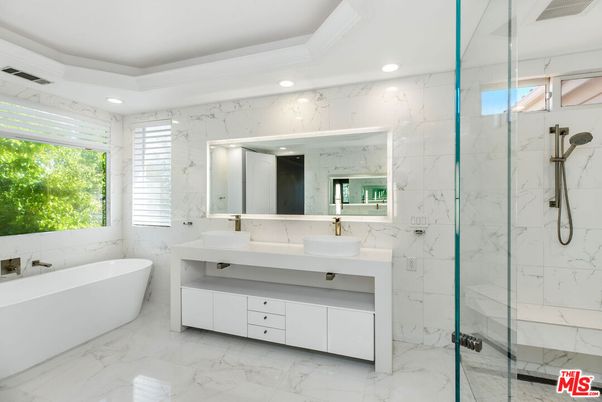 Bathroom, Dual Sink Vanities, Free Standing Baths, Glass Shower, Interior, Marble, Marble Walls, Recessed Lighting