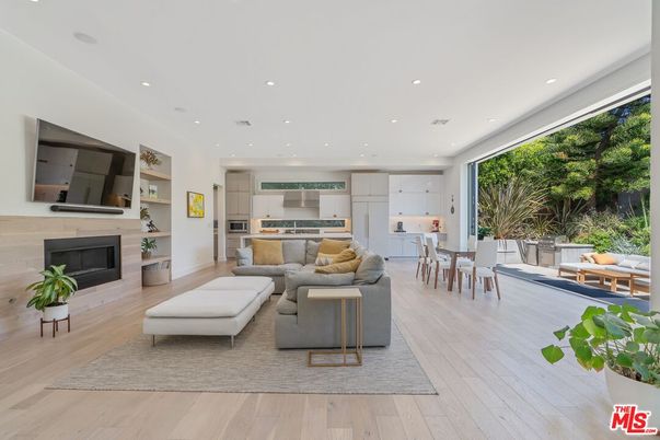 Dining room, Fireplace, Interior, Kitchen, Living room, Recessed Lighting, Stainless Steel Appliances, Wood Texture Flooring