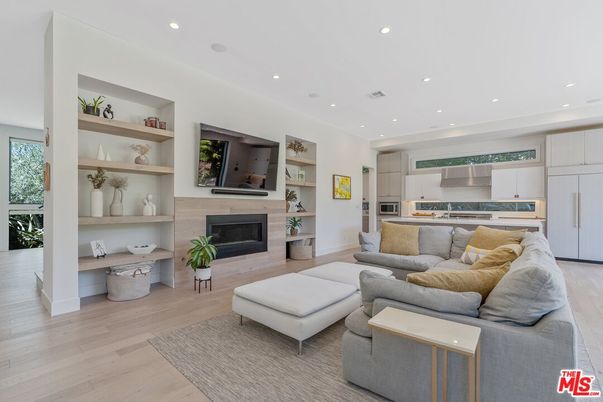 Fireplace, Interior, Kitchen, Living room, Recessed Lighting, Stainless Steel Appliances, Wood Texture Flooring