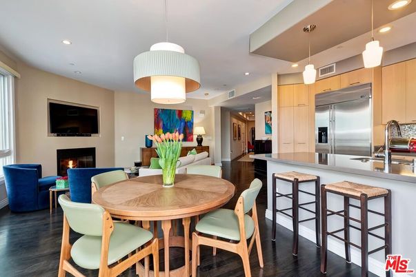 Dining room, Fireplace, Interior, Kitchen, Living room, Pendant Lights, Recessed Lighting, Stainless Steel Appliances, Wood Texture Flooring