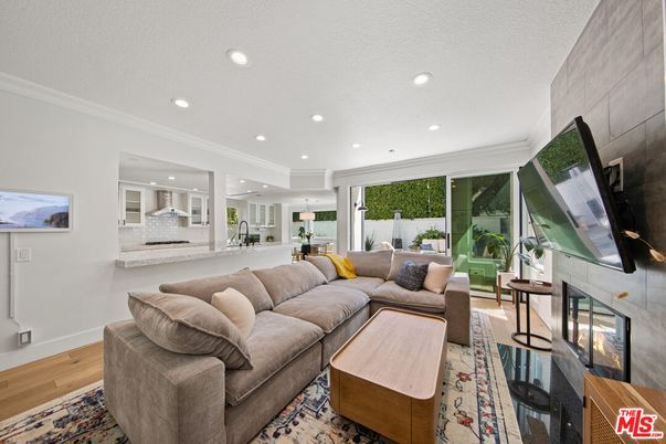 Fireplace, Interior, Living room, Recessed Lighting, Wood Texture Flooring
