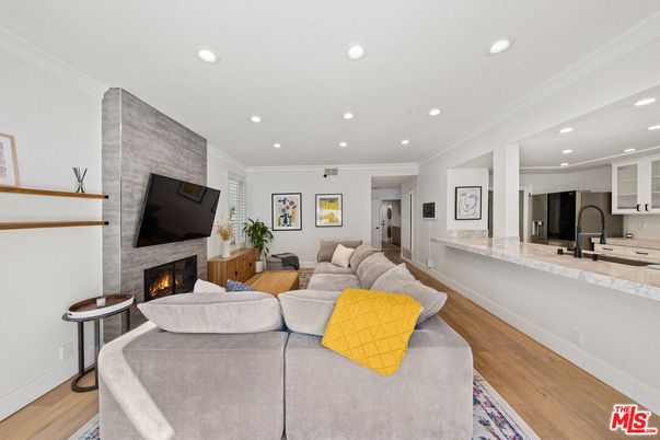 Fireplace, Interior, Kitchen, Living room, Recessed Lighting, Wood Texture Flooring
