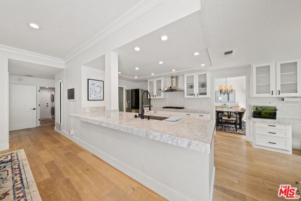 Chandelier, Dining room, Interior, Kitchen, Recessed Lighting, Stainless Steel Appliances, Wood Texture Flooring