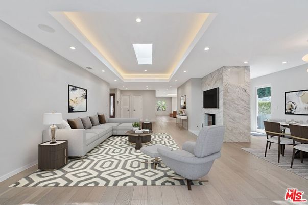Dining room, Fireplace, Interior, Living room, Recessed Lighting, Stone Walls, Wood Texture Flooring