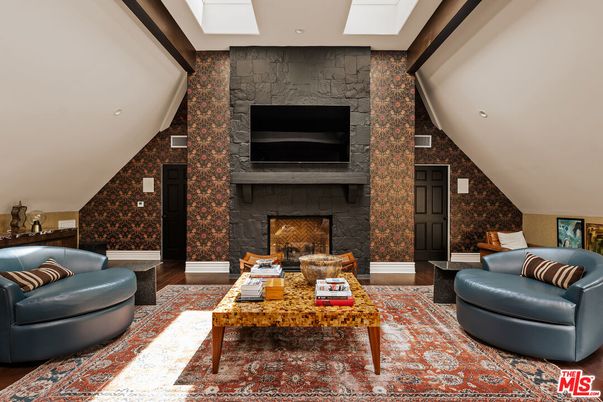 Fireplace, Interior, Living room, Recessed Lighting, Stone Walls, Wood Texture Flooring
