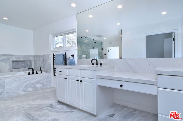 Bathroom, Dual Sink Vanities, Glass Shower, Interior, Marble, Marble Walls, Recessed Lighting