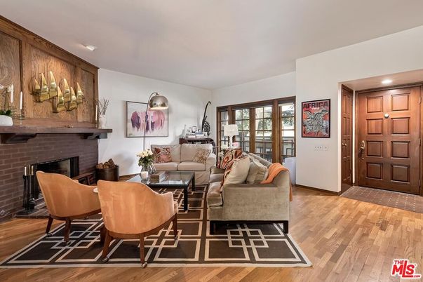 Fireplace, Interior, Living room, Recessed Lighting, Stone Walls, Wood Texture Flooring