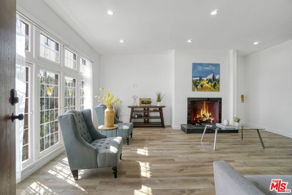 Fireplace, Interior, Living room, Recessed Lighting, Wood Texture Flooring