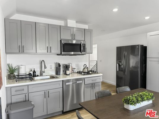 Interior, Kitchen, Recessed Lighting, Stainless Steel Appliances, Wood Texture Flooring