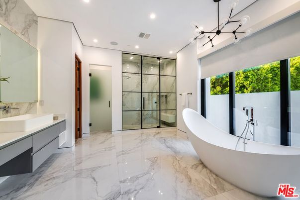 Bathroom, Free Standing Baths, Glass Shower, Interior, Marble, Marble Walls, Pendant Lights, Recessed Lighting