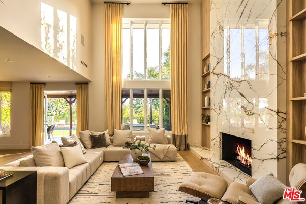 Fireplace, Interior, Living room, Marble Walls, Recessed Lighting, Wood Texture Flooring