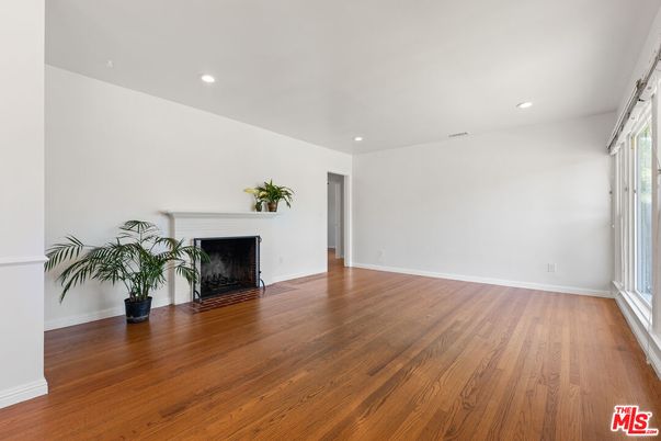 Empty room, Fireplace, Interior, Recessed Lighting, Wood Texture Flooring