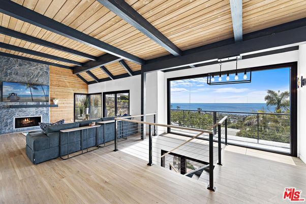 Fireplace, Interior, Living room, Pendant Lights, Stone Walls, Water, Wooden Beams, Wooden Ceilings, Wood Texture Flooring