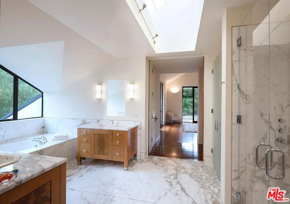 Bathroom, Dual Sink Vanities, Glass Shower, Interior, Marble, Marble Walls, Wood Texture Flooring