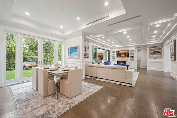 Dining room, Fireplace, Interior, Living room, Recessed Lighting, Wood Texture Flooring