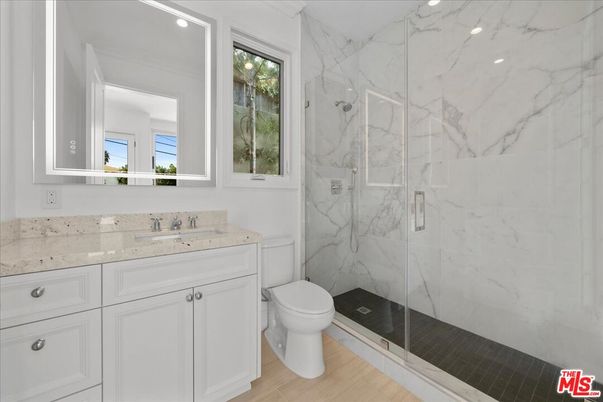 Bathroom, Glass Shower, Interior, Marble Walls, Recessed Lighting, Wood Texture Flooring