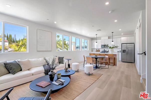 Dining room, Interior, Kitchen, Living room, Pendant Lights, Recessed Lighting, Stainless Steel Appliances, Wood Texture Flooring
