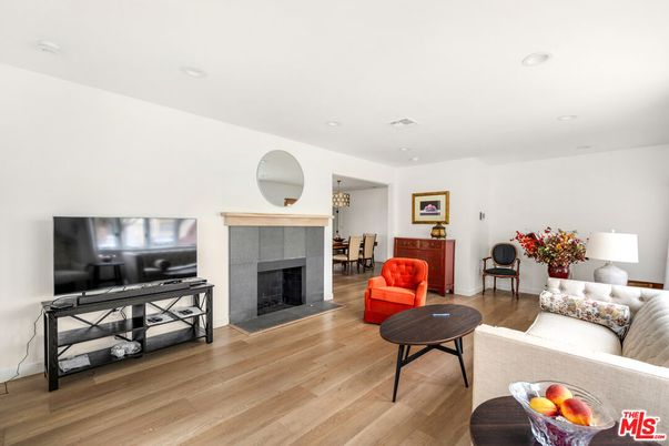 Dining room, Fireplace, Interior, Living room, Recessed Lighting, Wood Texture Flooring