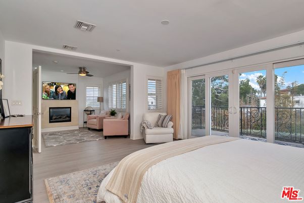 Bedroom, Fireplace, Interior, Recessed Lighting, Wood Texture Flooring