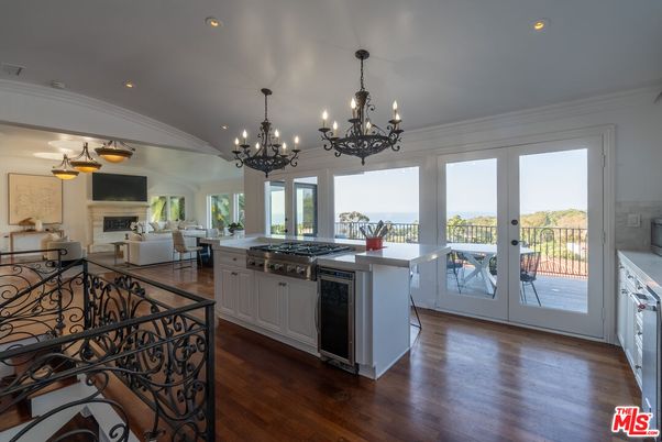 Chandelier, Dining room, Fireplace, Interior, Kitchen, Living room, Recessed Lighting, Wood Texture Flooring