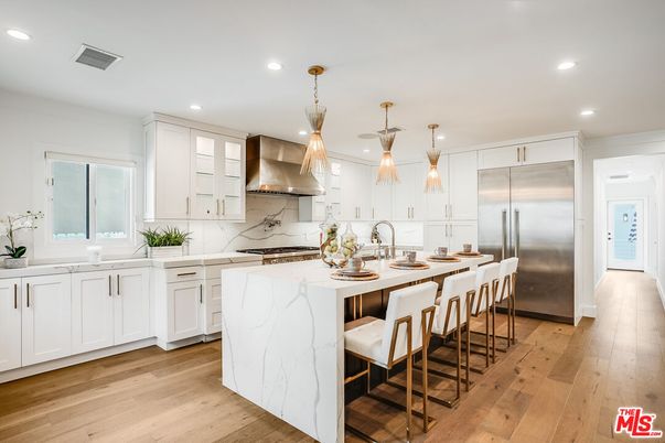 Interior, Kitchen, Marble Walls, Pendant Lights, Recessed Lighting, Stainless Steel Appliances, Wood Texture Flooring