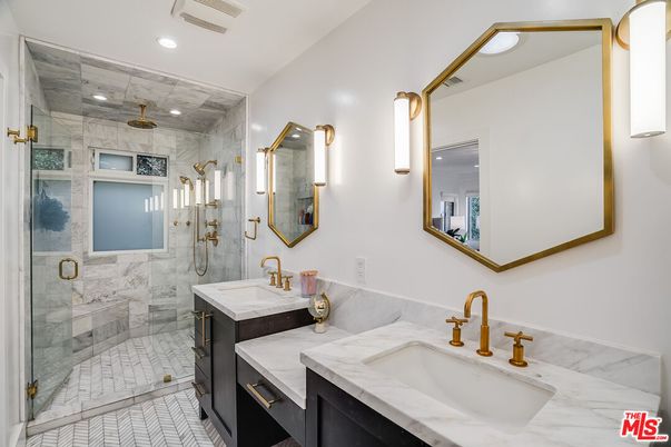 Bathroom, Dual Sink Vanities, Glass Shower, Interior, Marble, Marble Walls, Recessed Lighting
