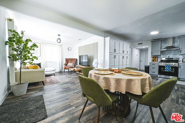 Dining room, Interior, Kitchen, Living room, Recessed Lighting, Stainless Steel Appliances, Wood Texture Flooring