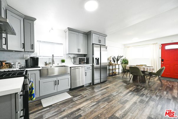 Dining room, Interior, Kitchen, Recessed Lighting, Stainless Steel Appliances, Wood Texture Flooring