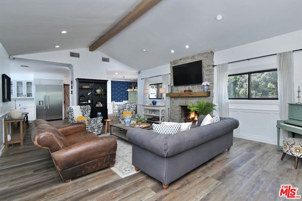 Fireplace, Interior, Kitchen, Living room, Pendant Lights, Recessed Lighting, Stainless Steel Appliances, Wooden Beams, Wood Texture Flooring