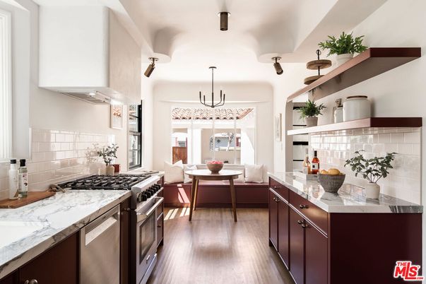 Chandelier, Dining room, Interior, Kitchen, Pendant Lights, Stainless Steel Appliances, Wood Texture Flooring