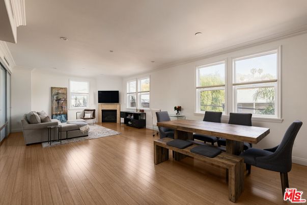 Dining room, Fireplace, Interior, Living room, Recessed Lighting, Wood Texture Flooring