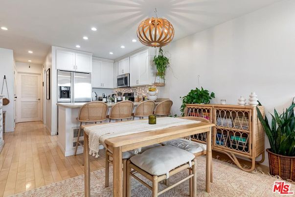 Dining room, Interior, Kitchen, Pendant Lights, Recessed Lighting, Stainless Steel Appliances, Wood Texture Flooring
