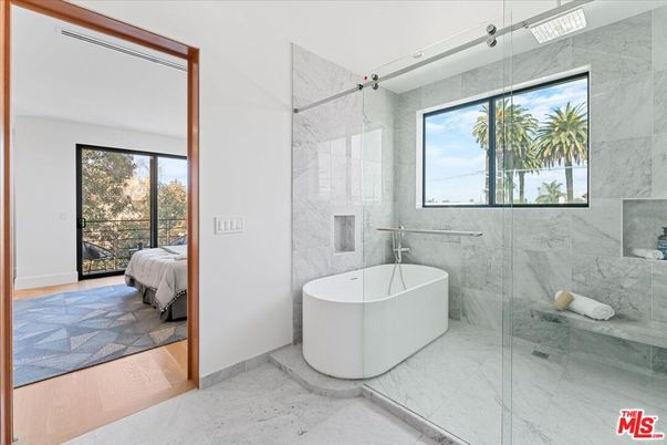 Bathroom, Bedroom, Free Standing Baths, Glass Shower, Interior, Marble, Marble Walls, Wood Texture Flooring