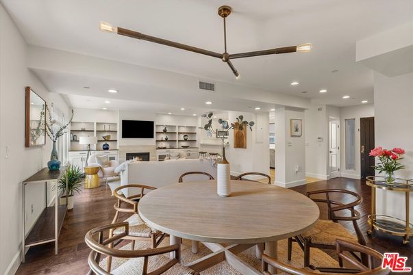 Dining room, Fireplace, Interior, Living room, Pendant Lights, Recessed Lighting, Wood Texture Flooring