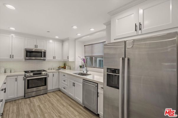 Interior, Kitchen, Recessed Lighting, Stainless Steel Appliances, Wood Texture Flooring