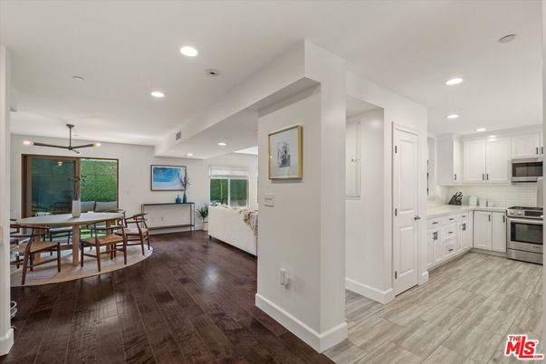 Dining room, Interior, Kitchen, Pendant Lights, Recessed Lighting, Stainless Steel Appliances, Wood Texture Flooring