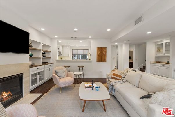 Fireplace, Interior, Living room, Recessed Lighting, Wood Texture Flooring