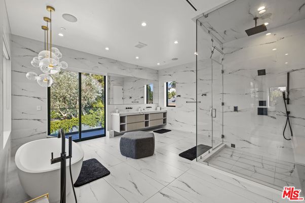 Bathroom, Dual Sink Vanities, Free Standing Baths, Glass Shower, Interior, Marble, Marble Walls, Pendant Lights, Recessed Lighting