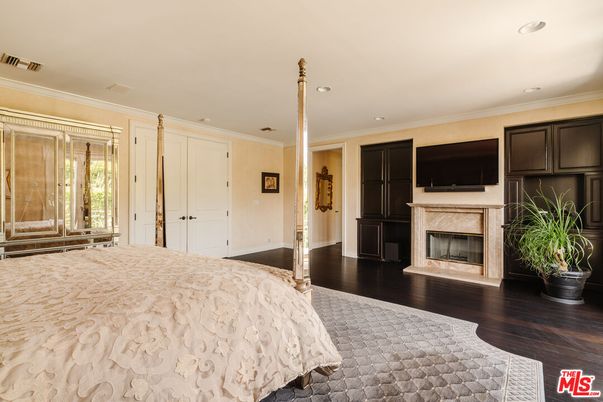 Bedroom, Fireplace, Interior, Recessed Lighting, Wood Texture Flooring