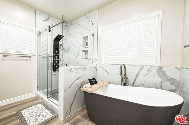Bathroom, Free Standing Baths, Glass Shower, Interior, Marble Walls, Wood Texture Flooring