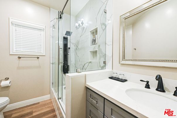 Bathroom, Glass Shower, Interior, Marble Walls, Wood Texture Flooring