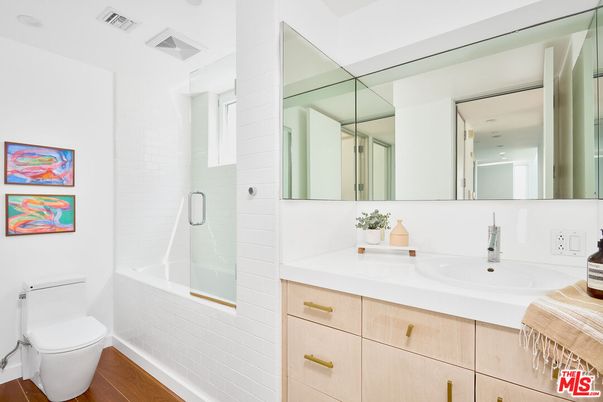 Bathroom, Dual Sink Vanities, Glass Shower, Interior, Wood Texture Flooring