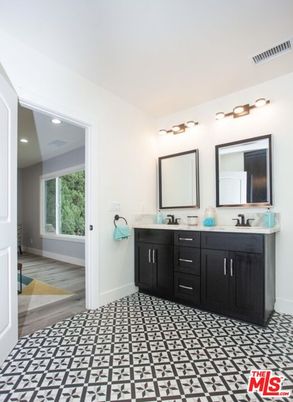 Bathroom, Dual Sink Vanities, Interior, Recessed Lighting, Wood Texture Flooring