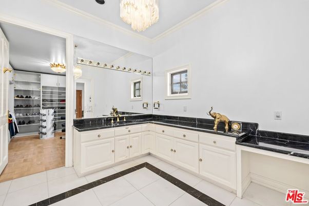 Bathroom, Chandelier, Dual Sink Vanities, Interior, Wood Texture Flooring