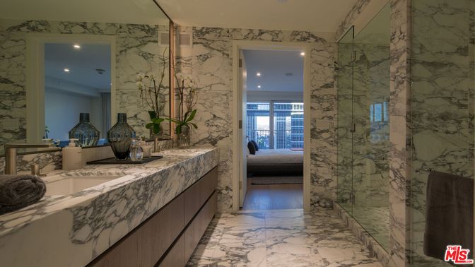 Bathroom, Dual Sink Vanities, Glass Shower, Interior, Marble, Marble Walls, Recessed Lighting