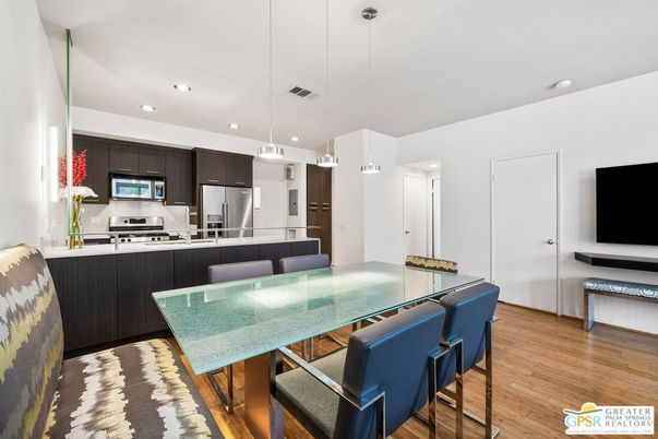 Dining room, Interior, Kitchen, Pendant Lights, Recessed Lighting, Stainless Steel Appliances, Wood Texture Flooring