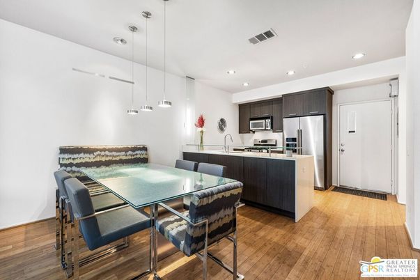 Dining room, Interior, Kitchen, Pendant Lights, Recessed Lighting, Stainless Steel Appliances, Wood Texture Flooring