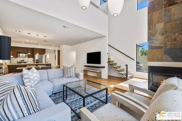 Fireplace, Interior, Kitchen, Living room, Pendant Lights, Recessed Lighting, Stainless Steel Appliances, Wood Texture Flooring